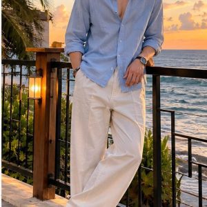 Men's light blue casual linen shirt with beige trousers